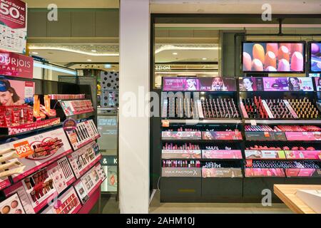 SINGAPORE - APRIL 03, 2019: cosmetics products on display at Watsons store in Singapore. Watsons is the largest health care and beauty care chain stor Stock Photo