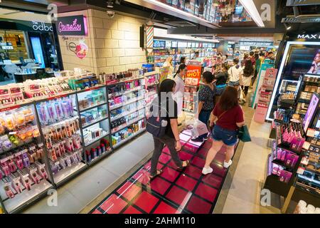 SINGAPORE - APRIL 03, 2019: cosmetics products on display at Watsons store in Singapore. Watsons is the largest health care and beauty care chain stor Stock Photo