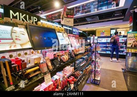 SINGAPORE - APRIL 03, 2019: cosmetics products on display at Watsons store in Singapore. Watsons is the largest health care and beauty care chain stor Stock Photo