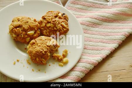 cereal butter cookie bite on white plate Stock Photo