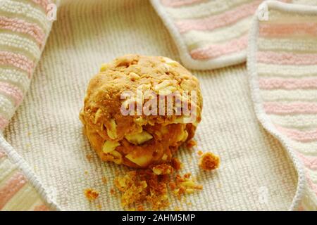 cereal butter cookie bite on cloth Stock Photo