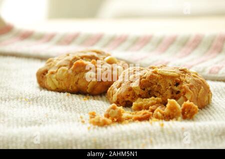 cereal butter cookie bite on cloth Stock Photo