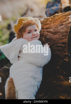 Little boy dressed as Max from Where The Wild Things Are in the woods