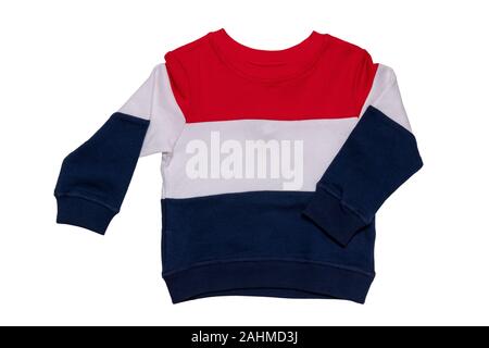 Spring and autumn children clothes. A red white blue striped cozy warm sweater or pullover isolated on a white background. Winter fashion for child bo Stock Photo