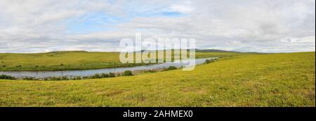 Tundra of the Yamal Peninsula. Panorama of the summer tundra of the Polar Ural Natural Park. Stock Photo