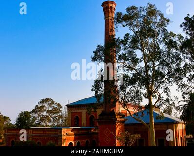 Ruins of Abandoned former Victorian Era Industrial Site, Walka Water Works, Italianate Architecture and smoke stack, Maitland, Australia Stock Photo