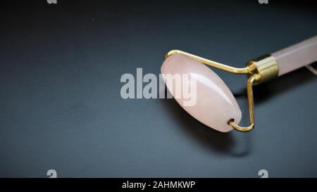Roller made of rose quartz for Health Treatment and massage Stock Photo