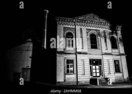 Ruins of Abandoned former Victorian Era Industrial Site, Walka Water Works, Italianate Architecture, at night, Maitland, Australia Stock Photo
