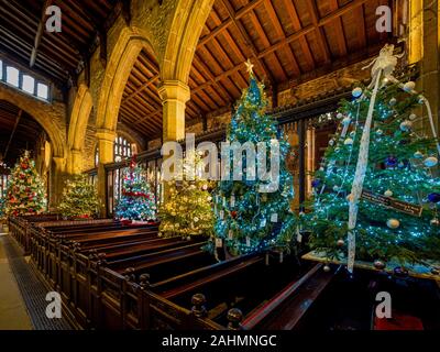 Interior of Halifax Minster at Christmas decorated with multiple ...