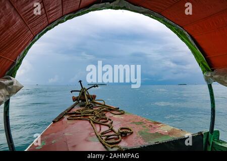 Traditional local boat sailing to Prison Island, for a tourist day trip, Zanzibar, Tanzania, East Africa Stock Photo