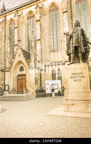 monument to j.s. bach, st thomas church in background Stock Photo