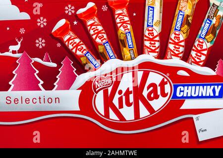 Box of Nestle KitKat selection chunky for Christmas  - different flavours - peanut butter, orange, white, salted caramel fudge flavour flavors flavor Stock Photo