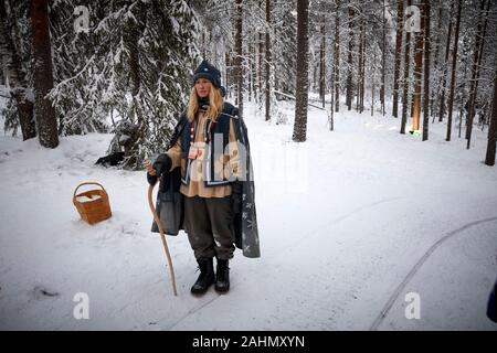 Finnish Rovaniemi a city in Finland and the region of Lapland Santa Park, Santa Claus  helper Christmas lady Elf Stock Photo