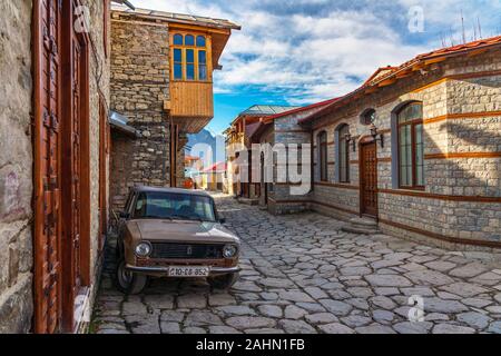 Lagich, Azerbaijan, December 23, 2019. Retro car on old cobbled street in the village Stock Photo