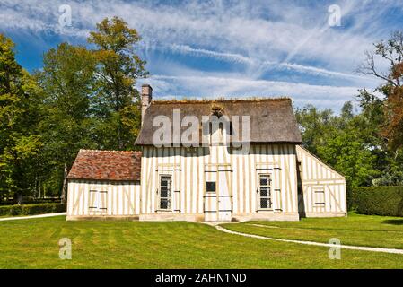 Anglo Chinese garden with original Hamlet make a pleasance part of Chantilly Castle Park, Oise, France Stock Photo