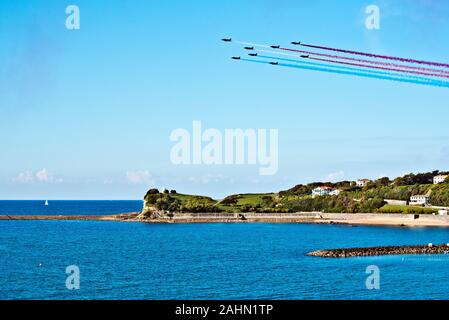 Saint-Jean-de-Luz, France, October 3, 2015 Famous demonstration of French Air force, Patrouille de France in formation above Pointe Saint Barbe of Sai Stock Photo