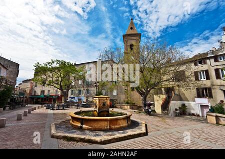 Doria square street view in Saint-Florent city in Corsica Island, Haute-Corse, France Stock Photo