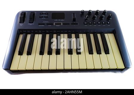 USB MIDI Synthesizer Keyboard Controller. Shot on white background. Stock Photo