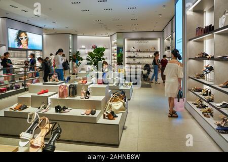 SINGAPORE - CIRCA APRIL, 2019: Charles & Keith sign over store entrance in  The Shoppes at Marina Bay Sands. CHARLES & KEITH is a Singaporean fast-fash  Stock Photo - Alamy