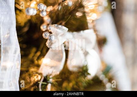 Bow Decoration on Christmas tree close up Stock Photo