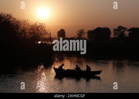 Islamabad. 31st Dec, 2019. Tourists ride on a boat during the last sunset of 2019 at Lake View Park in Islamabad, Pakistan on Dec. 31, 2019. Credit: Ahmad Kamal/Xinhua/Alamy Live News Stock Photo