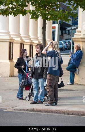 Random people on a sidewalk in Nottingham, East Midlands, UK Stock Photo