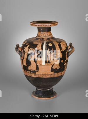 Ancient Greek. Hydria (Water Jar). 360 BC–350 BC. Puglia. terracotta, decorated in the red-figure technique In ancient Greece it was considered uncivilized for to consume undiluted wine, so water was fetched from a public fountain house in a large handled jar like this one and used to dilute large quantities of wine. The horizontal handles made it easier to carry, while the vertical handle at the back was used for pouring. On the front of the vessel, six female figures are arranged around a funeral momument, topped by a tall white pillar. Some of the women are standing while others are seated, Stock Photo