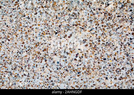 Pebble dash exterior wall textured background Stock Photo