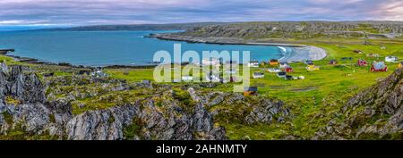 Panoramic view at abandoned fishers’ village Hamningberg and the shore of the Barents Sea as viewed from the fort. Finnmark, Norway. Stock Photo