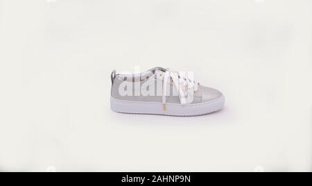 Women single sneaker isolated on white background with clipping path Stock Photo