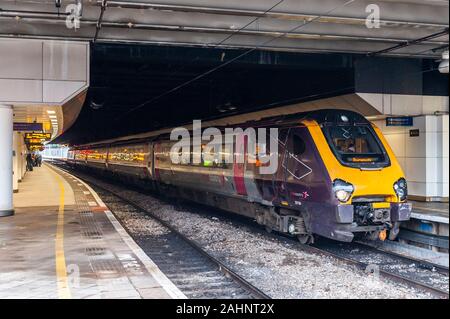 Cross Country Voyager prepares to depart Birmingham New Street Railway Station, Birmingham, West Midlands, UK. Stock Photo