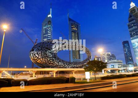 DUBAI, UAE - NOVEMBER 15: The construction of Museum of the Future in night illumination on November 15, 2019 in Dubai, UAE Stock Photo