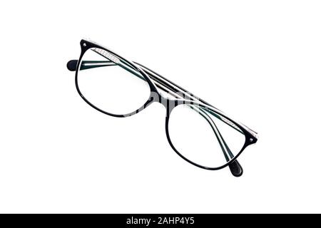 Folded fashion reading glasses for woman on white background Stock Photo