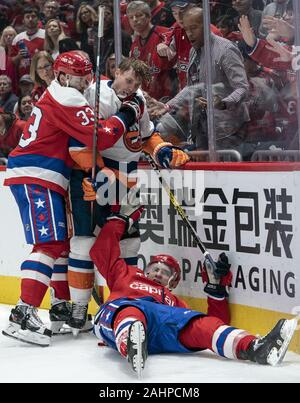 Florida Panthers defenseman Radko Gudas (7) and Toronto Maple Leafs  defenseman Jake McCabe (22) fall to the ice during the third period of Game  4 of an NHL hockey Stanley Cup second-round