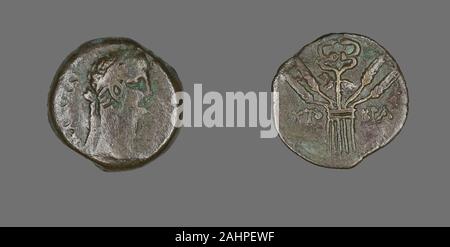 Ancient Egyptian. Coin Portraying Emperor Claudius. 41 AD–54 AD. Egypt. Bronze Stock Photo