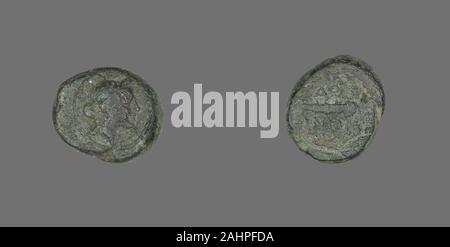 Ancient Greek. Coin Depicting the God Apollo. 133 BC. Ancient Greece. Bronze Stock Photo