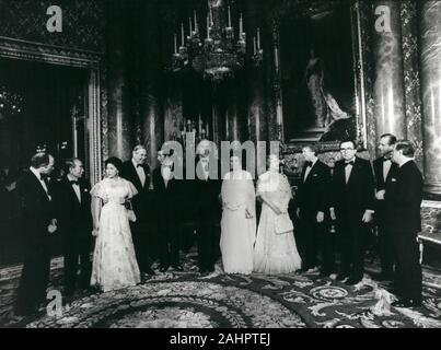 May 05, 1977 - London, England, United Kingdom -The Queen and members of the Royal Family entertained the seven world leaders in the blue drawing room at Buckingham Palace before last night's dinner. The leaders are in London for a two day Downing Street Summit talks. They are from left, PIERRE TRUDEAU (Canada), TAKEO FUKUDA (Japan, PRINCESS MARGARET, UK Prime Minister JAMES CALLAGHAN, PRINCES CHARLES, President VALERY GISCARD d'ESTAING (France), The QUEEN Elisabeth, President JIMMY CARTER (USA), GIULIO ANDREOTTI (Italy), PRINCE PHILLIP and German Chancellor HELMUT SCHMIDT (West Germany). (Cre Stock Photo