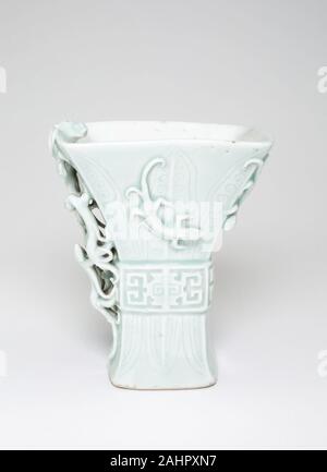 Cup in the Shape of an Archaic Bronze Vessel with Lizards. 1700–1899. China. Celadon-glazed porcelain with underglaze molded and incised decoration Stock Photo