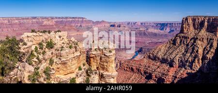 A dramatic four image pano stitch panoramic view of the mountainous Grand Canyon as seen from Moran Point. Stock Photo
