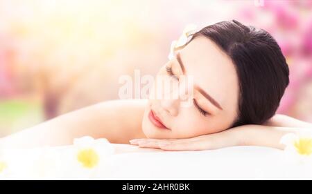 Beautiful young woman in spa salon Stock Photo