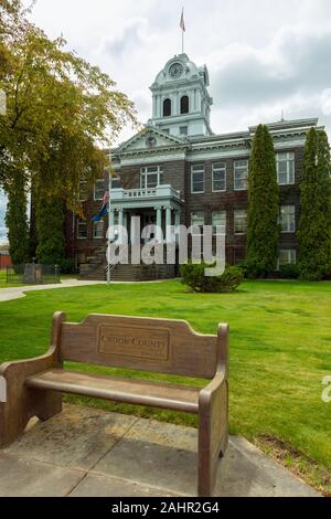 Prineville, Oregon - May 15, 2015: Memorial Bench in Front of the Crook County Courthouse Stock Photo