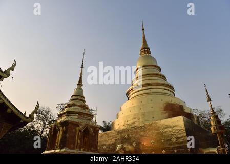 Golden colour stupa in Wat Phra Singh buddhist temple, Chiang Mai , Northern Thailand Stock Photo