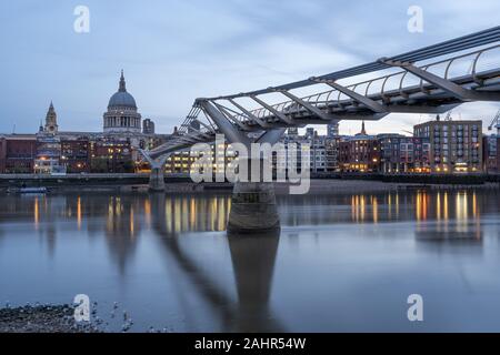 Millenium Bridge and Saint Paul's Cathedral in London, UK Stock Photo