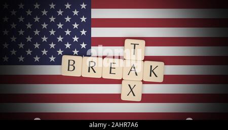 USA Politics Concept: Letter Tiles Tax Break On US Flag, 3d illustration Stock Photo