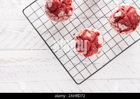 Red velvet muffin cupcake on cooling rack Stock Photo
