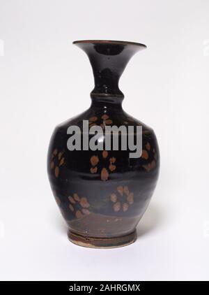 Vase with Stylized Petals. 1100–1368. China. Stoneware with black and brown glazes Stock Photo