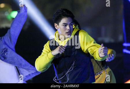 Pasay City, Philippines. 31st Dec, 2019. Migo Adecer performs during the New Year 2020 countdown. GMA Network on its 12th year partnership with SM Mall of Asia bring the New Year Countdown 2020 with biggest stars live performances at the SM Mall of Asia (MOA), Seaside Boulevard. (Photo by Herman Lumanog/Pacific Press) Credit: Pacific Press Agency/Alamy Live News Stock Photo