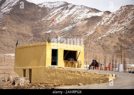 JAMMU KASHMIR, INDIA - MARCH 20 : Indian and tibetan people sale or buy food from local cafe and restaurant on Srinagar Leh Ladakh highway at Leh Lada Stock Photo