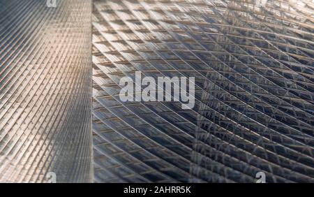 Industrial realistic gray color stainless steel flat part in partial focus after industrial CNC routing Stock Photo