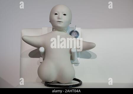 The Telenoid humanoid robot at Miraiken Science Museum, Odaiba, Tokyo. Japan. Stock Photo